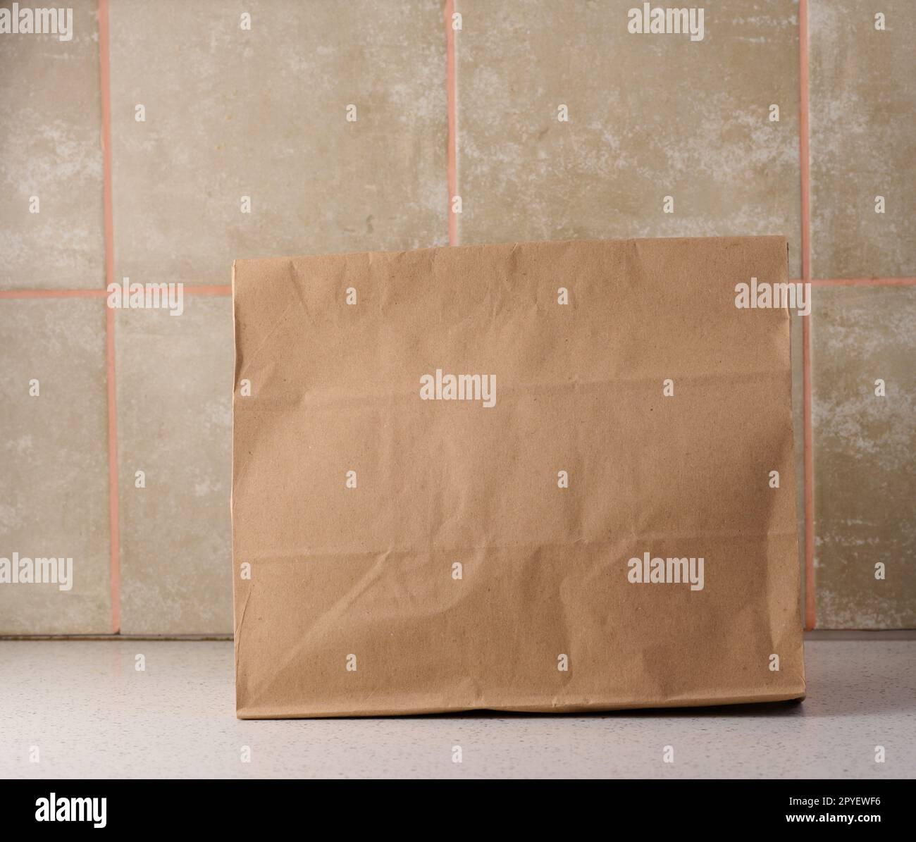 Full brown paper bag, takeaway food packaging Stock Photo
