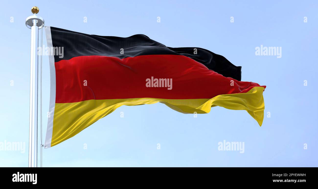 Germany national flag waving in the wind on a clear day Stock Photo