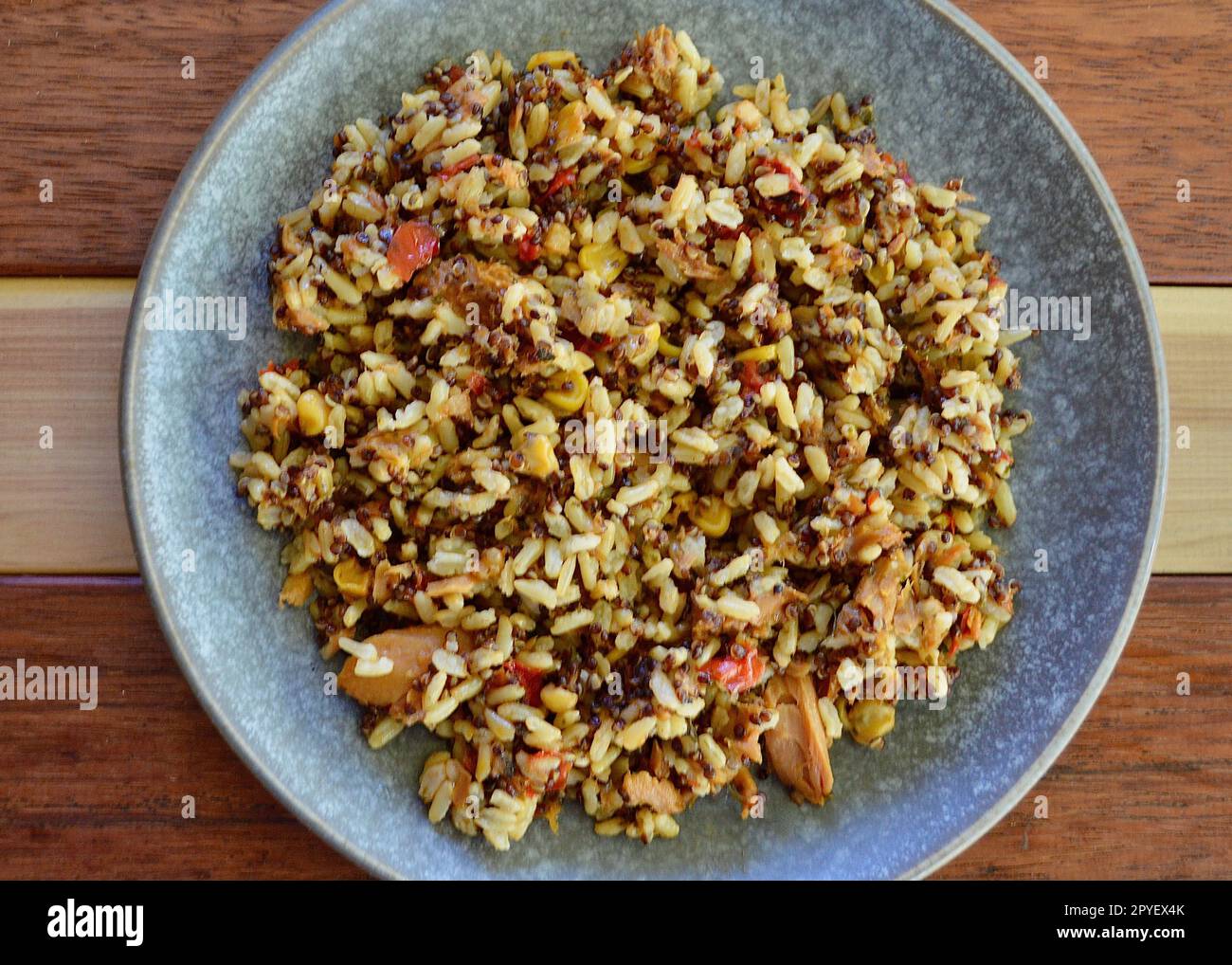 Tuna with brown rice and quinoa Stock Photo Alamy