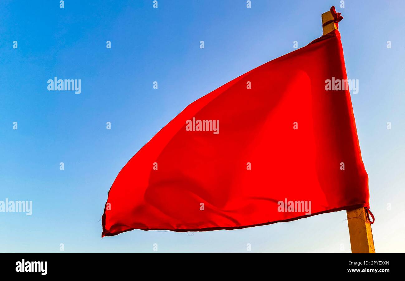 Red flag swimming prohibited high waves in Puerto Escondido Mexico. Stock Photo