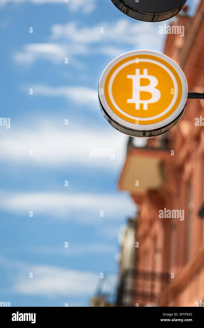 Bitcoin exchange sign in city street, cryptocurrency ATM sign Stock Photo -  Alamy