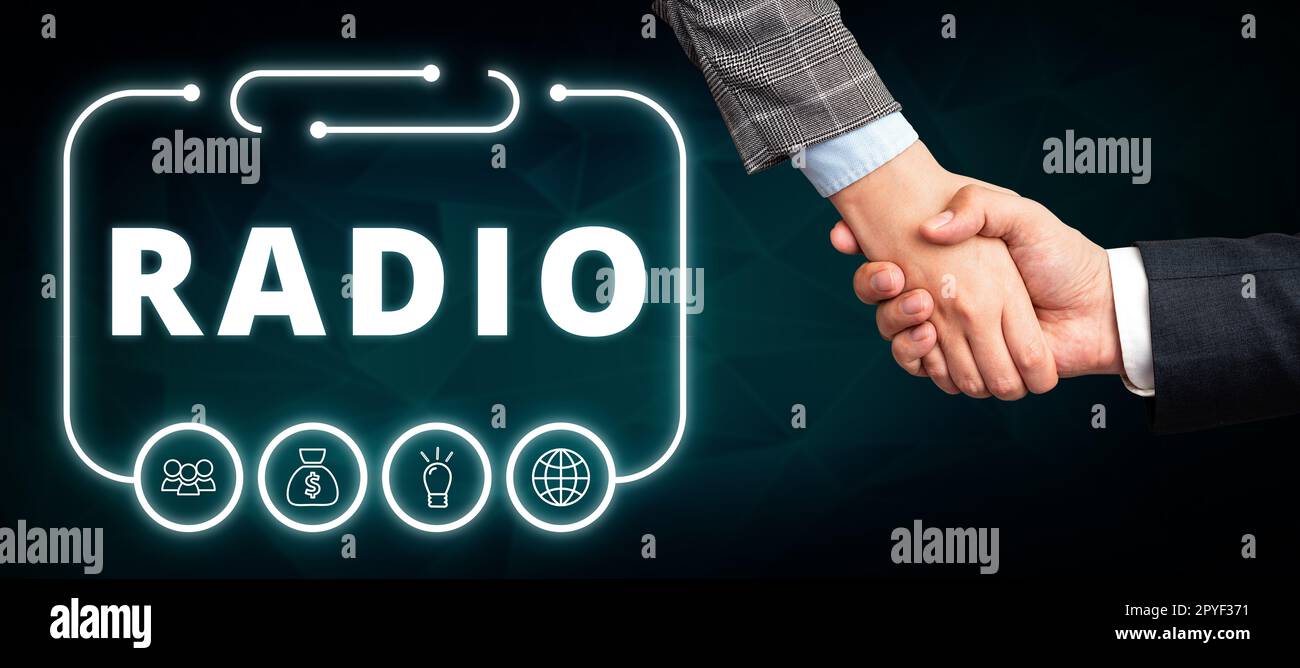 Hand writing sign Radio. Word for transmission reception