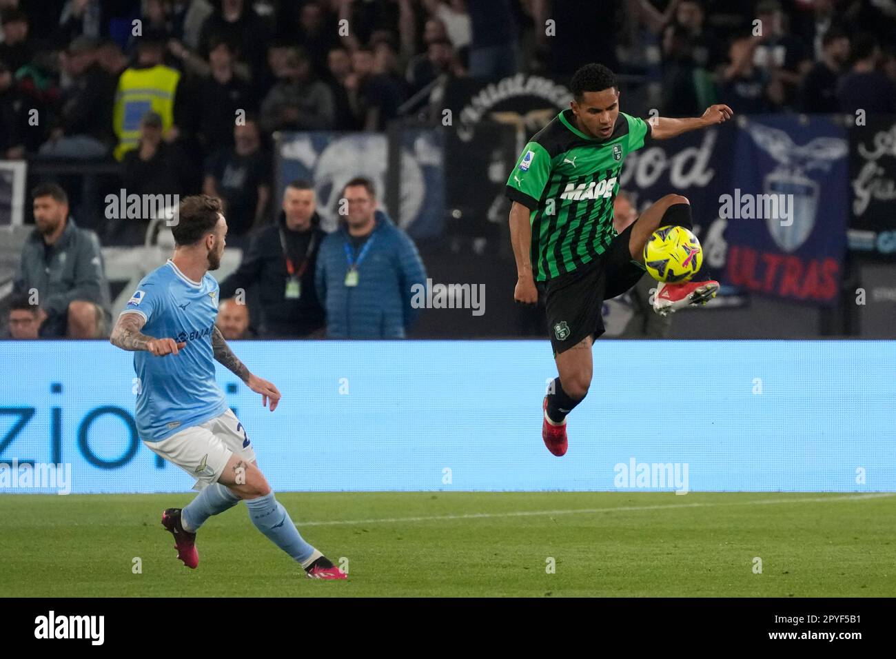 Sassuolo's Rogerio, right, controls the ball past Lazio's Manuel Lazzari  during a Serie A soccer match between Lazio and Sasusolo at Rome's Olympic  Stadium, in Rome, Italy, Wednesday, May 3, 2023. (AP