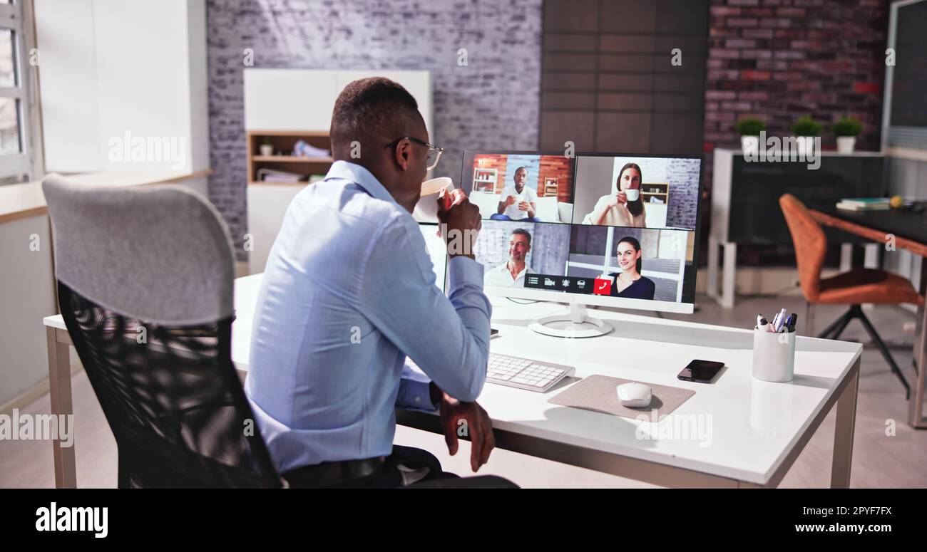 Virtual Video Conference Call Coffee Drinking Stock Photo