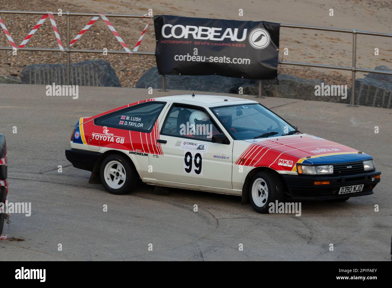 Martin Lush racing a 1986 Toyota Corolla AE86 competing in the Corbeau Seats rally on the seafront at Clacton, Essex, UK. Co driver David Taylor Stock Photo