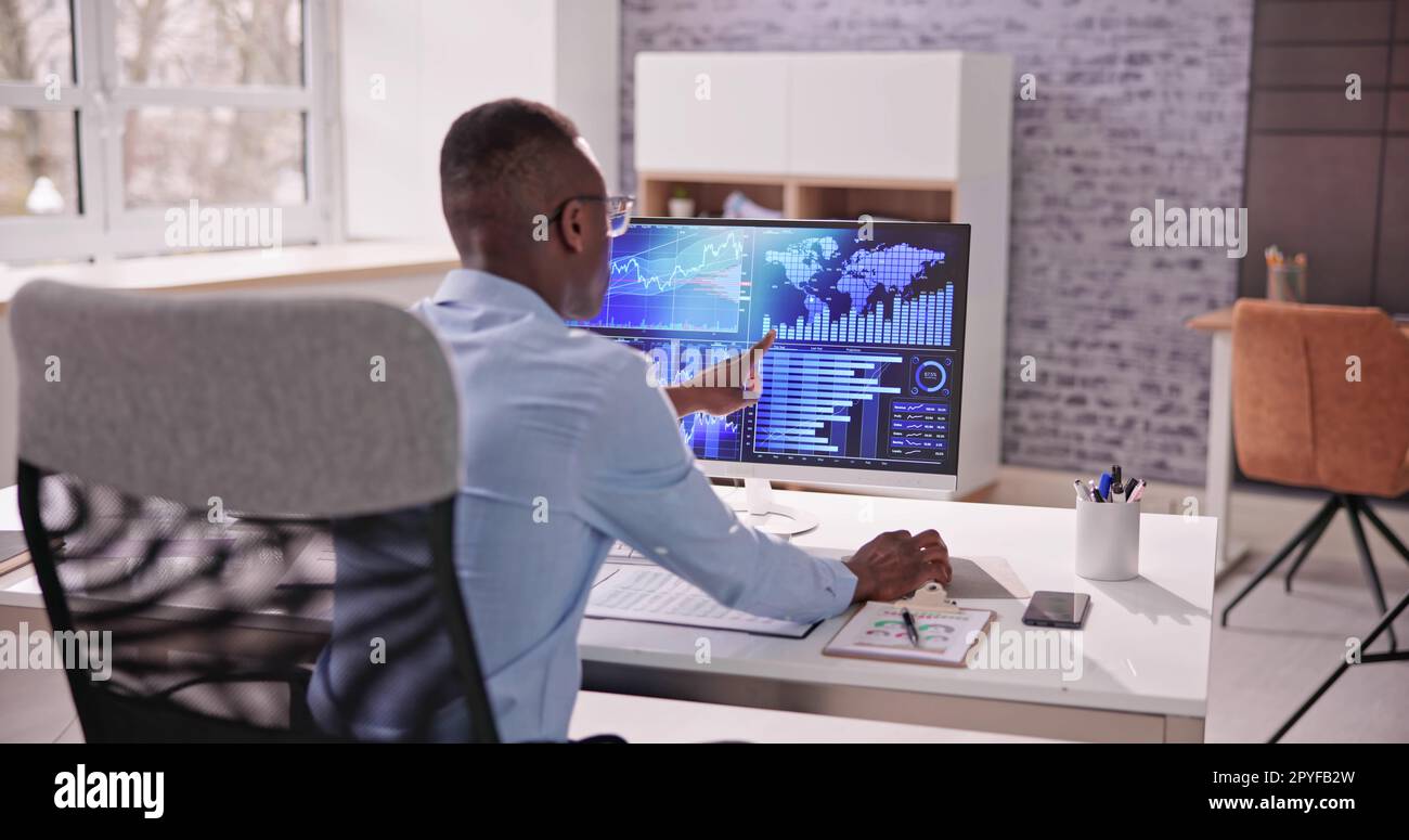 African American Data Analyst Using Data Analytics KPI Dashboard Stock ...