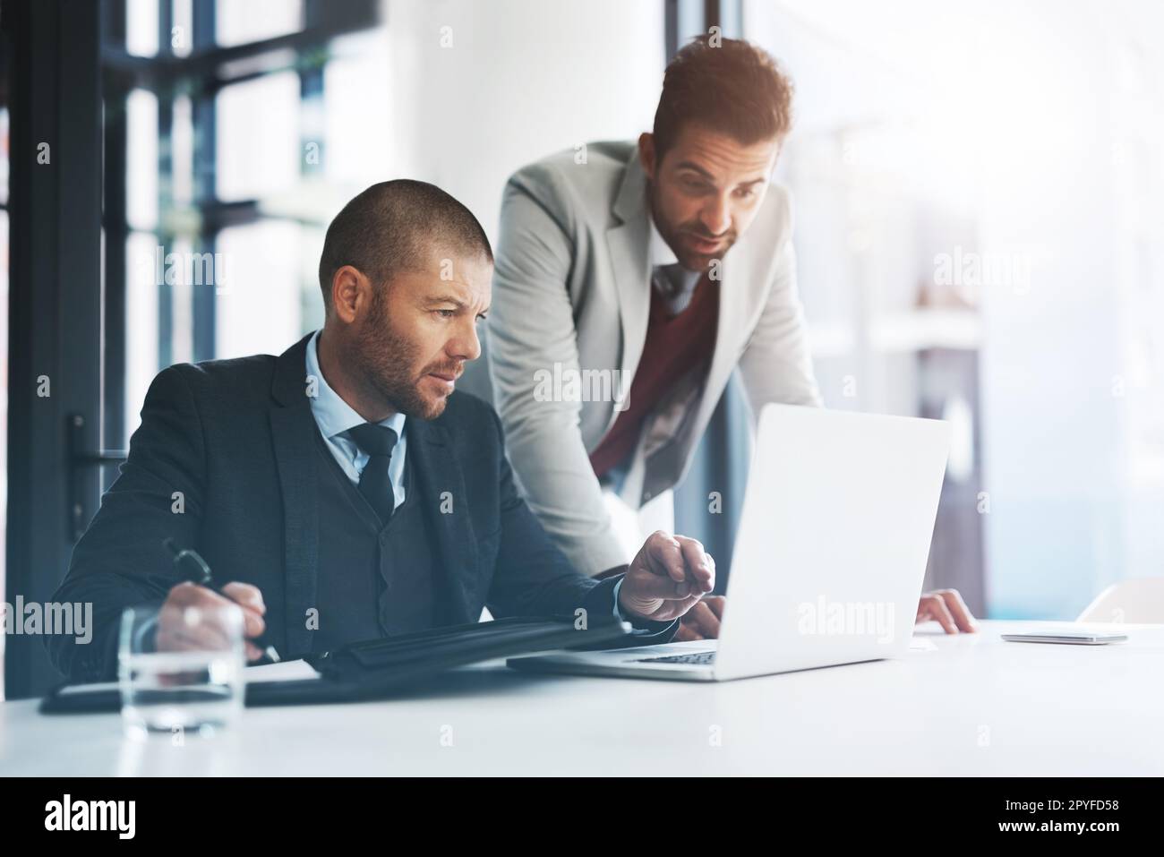 The best brains are on it. businesspeople working together in the office. Stock Photo