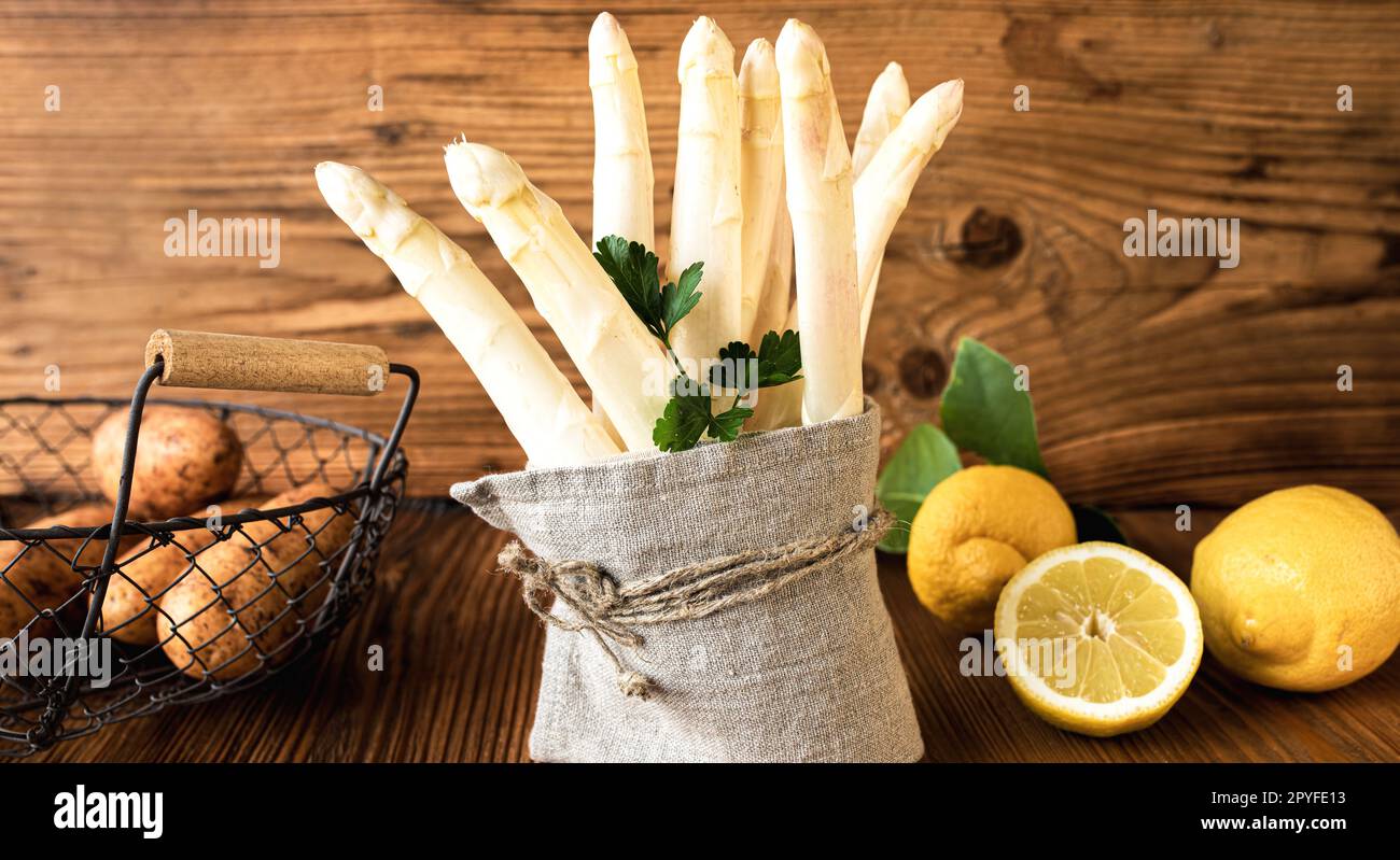 Fresh white asparagus and ingredients Stock Photo