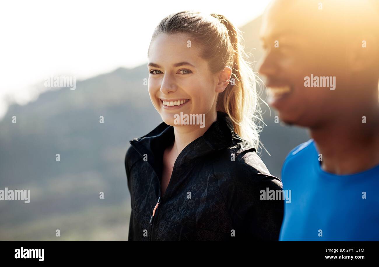 If Im free, its because Im always running. two athletes standing outdoors. Stock Photo