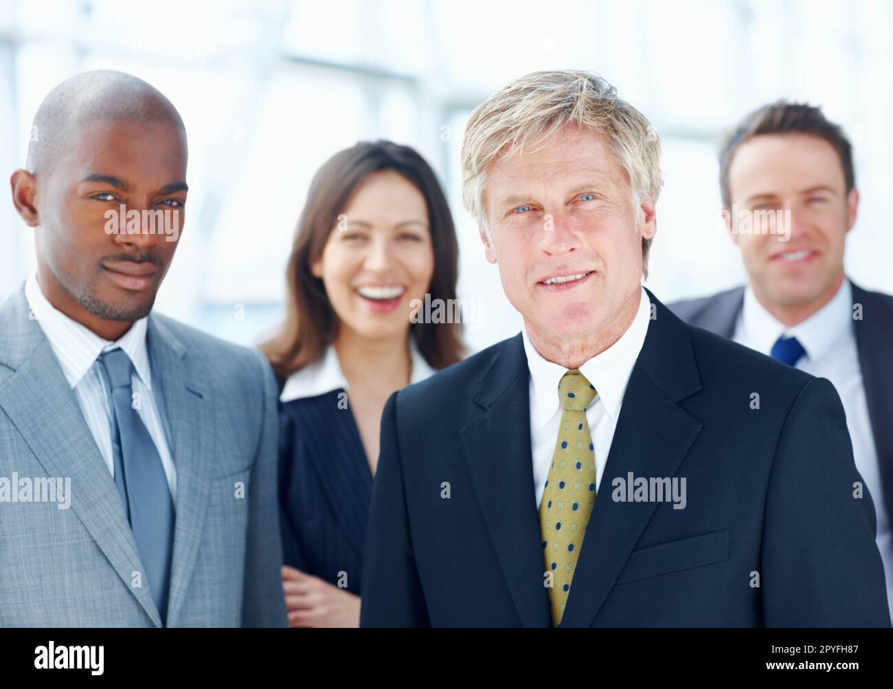 Confident business team. Portrait of confident multi racial business people looking at you in office. Stock Photo
