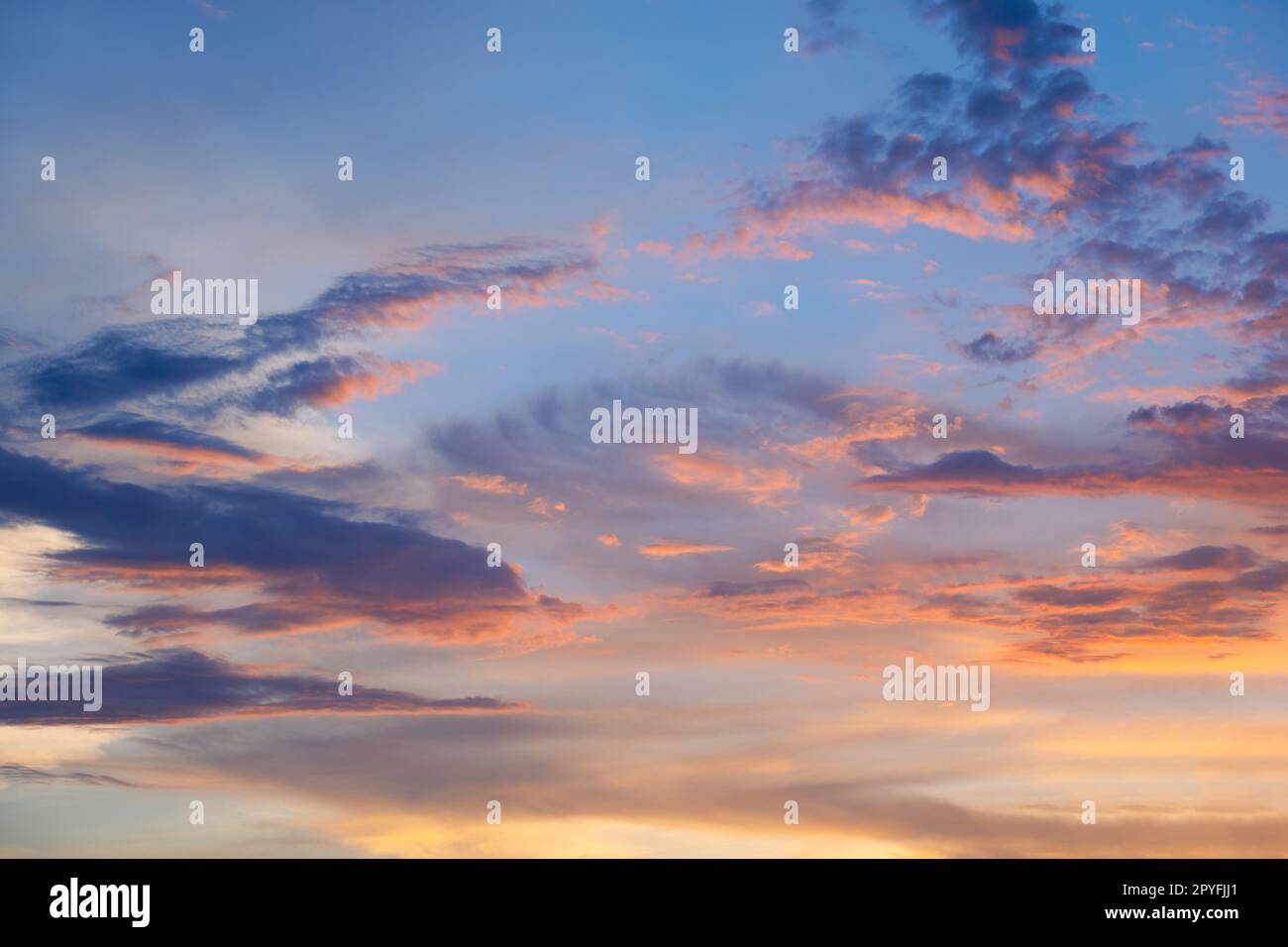 Sunset sky with beautiful clouds background. Stock Photo