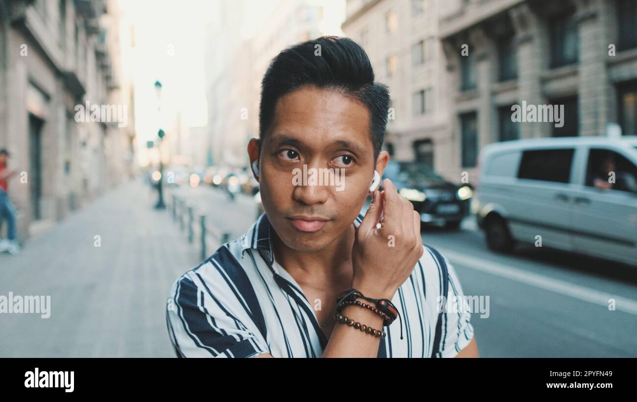 Man uses mobile phone walks hi-res stock photography and images - Alamy