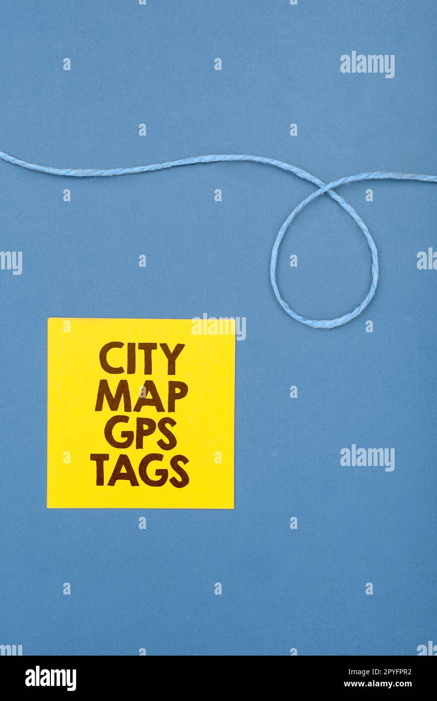 Hand writing sign City Map Gps Tags. Concept meaning global positioning system location of places in cities Stock Photo