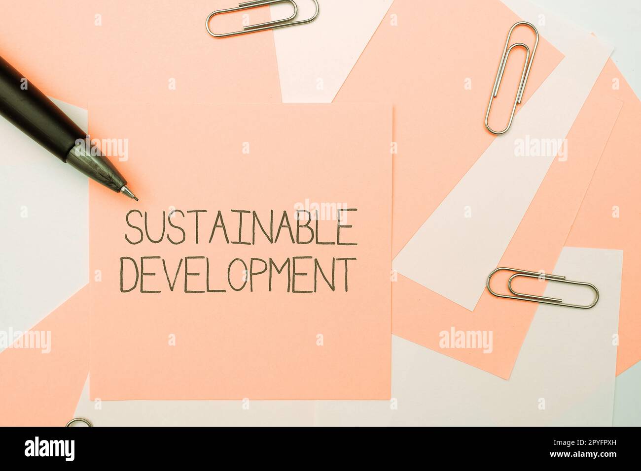 Hand writing sign Sustainable Development. Business overview the ability to be sustained, supported, upheld, or confirmed Stock Photo