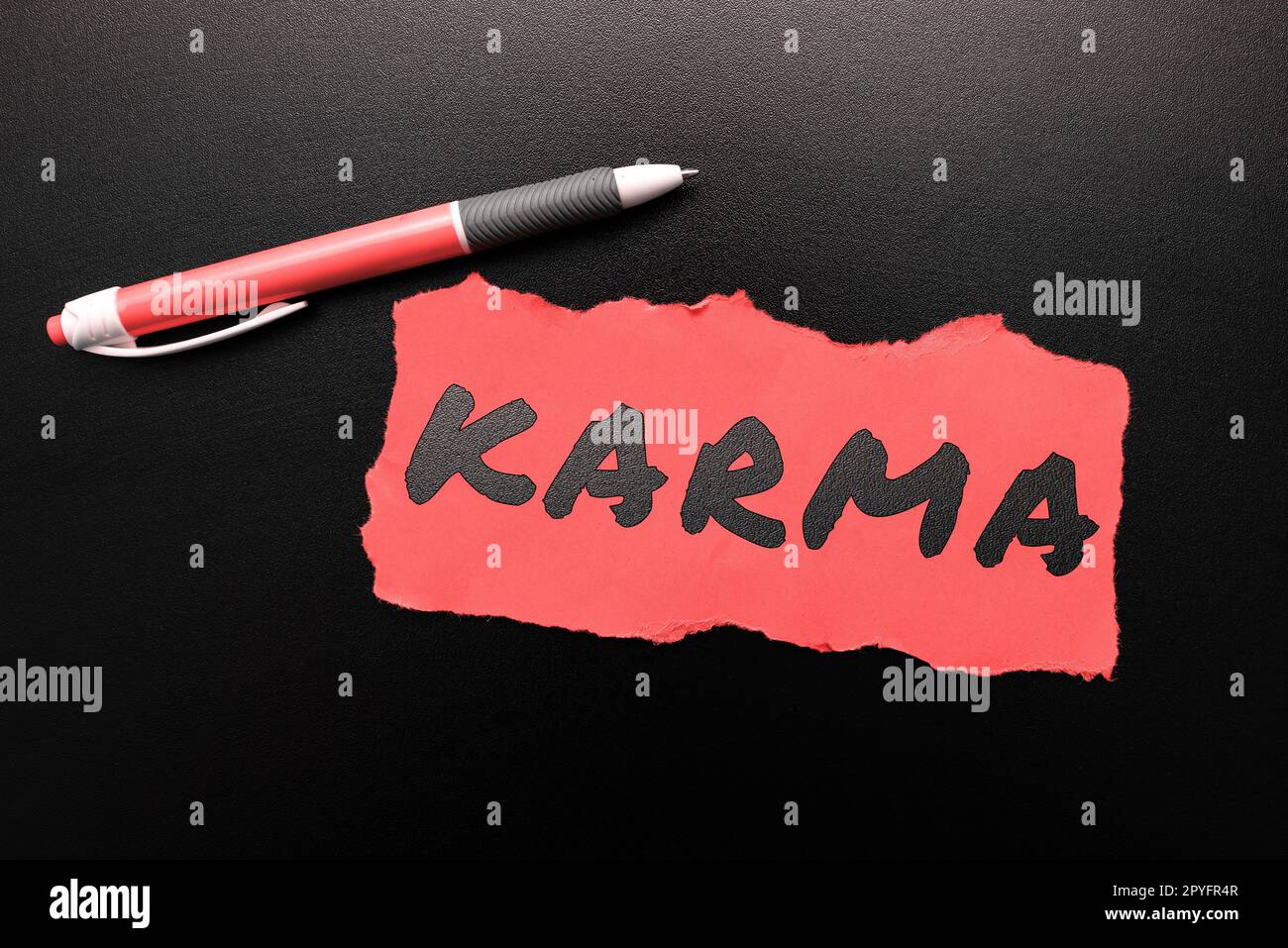 Writing displaying text Karma. Word Written on sum of a person actions in this and previous states of existence Stock Photo