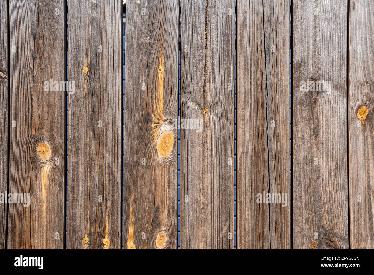 Background from a brown painted plank wall Stock Photo