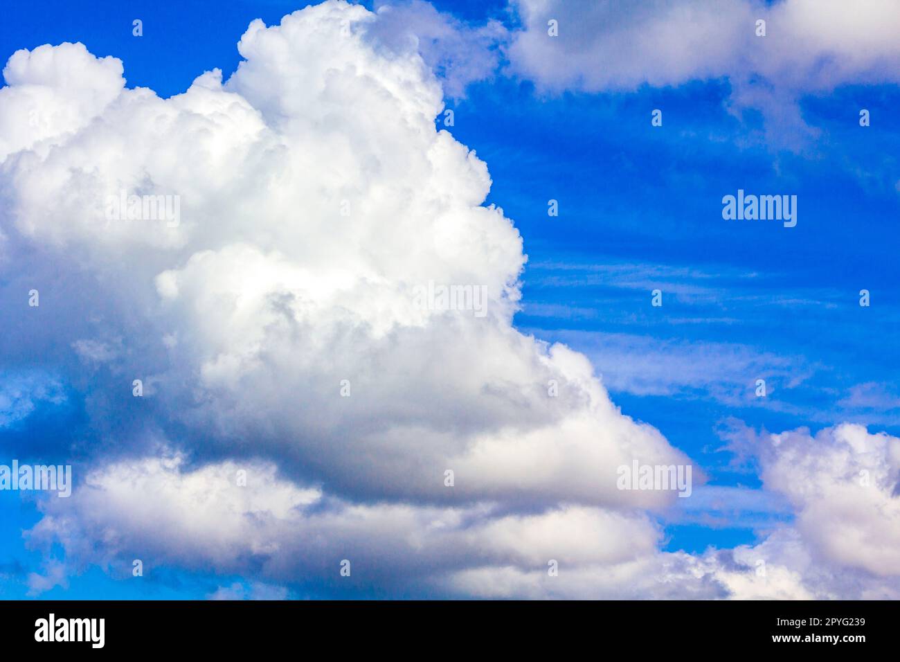 Beautiful fluffy clouds in blue sky in Germany Stock Photo - Alamy