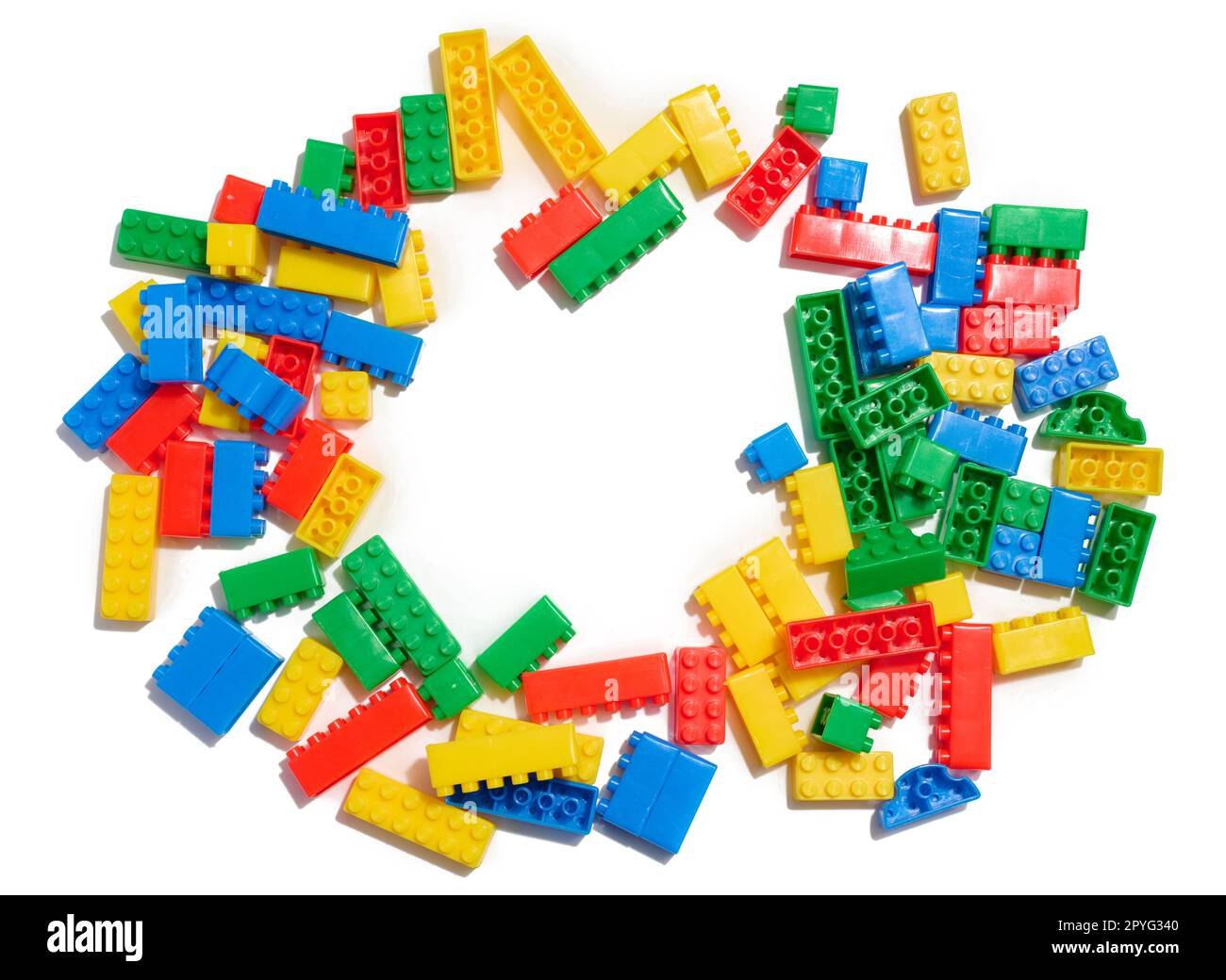 Multi-colored plastic cubes of a children's designer on a white isolated background, top view Stock Photo