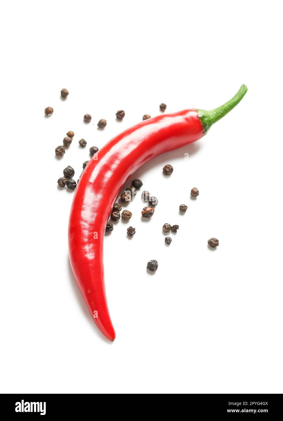 Fresh hot chili peppers and peppercorns on white background Stock Photo