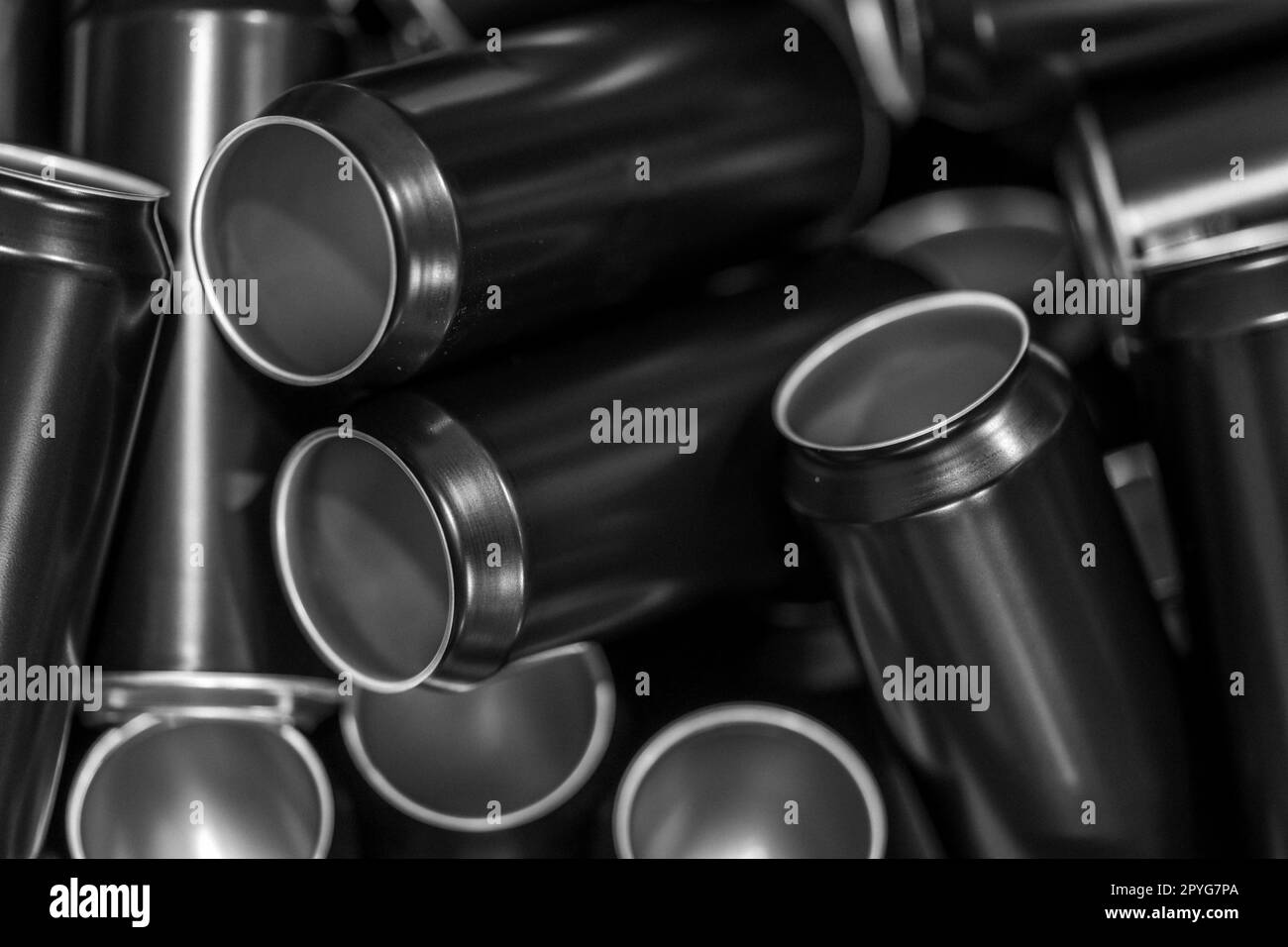 black aluminum drink cans in production Stock Photo