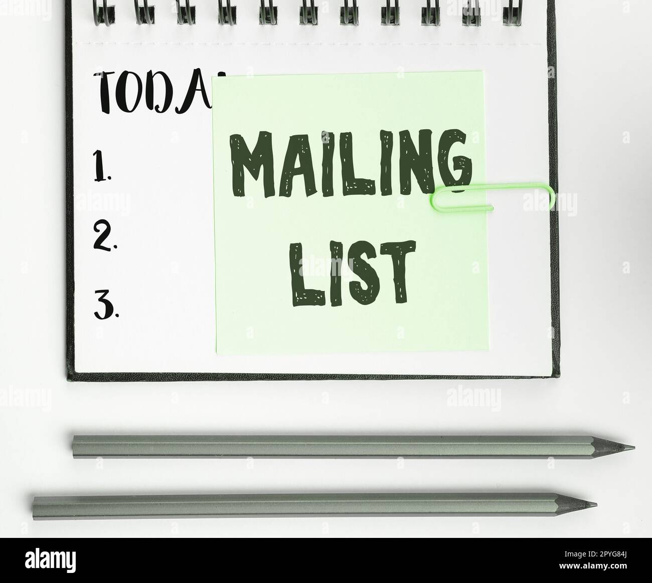 Handwriting text Mailing List. Word for list of people who subscribe to a periodic mailing distribution Stock Photo