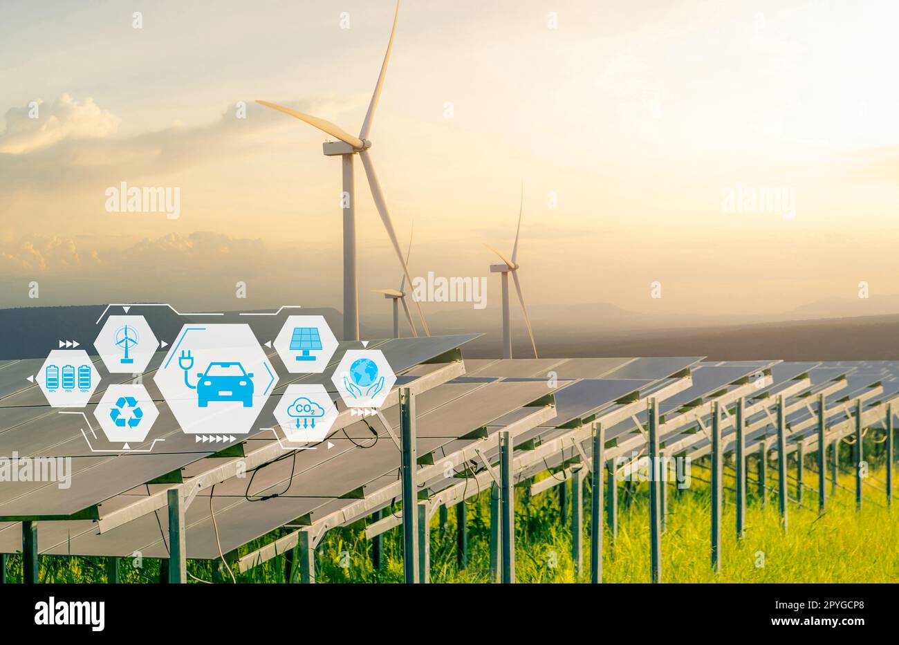 EV car and sustainable energy concept. Clean energy for charging electric vehicle battery. Solar and wind turbine farm. Solar, wind power. Renewable energy. Alternative electricity. Carbon neutrality. Stock Photo
