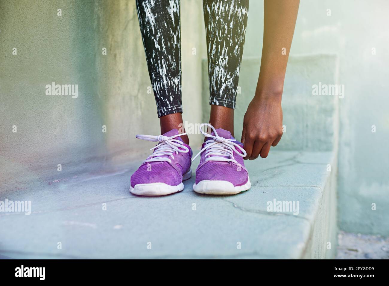 Shes got the right footwear. a female athletes footwear. Stock Photo