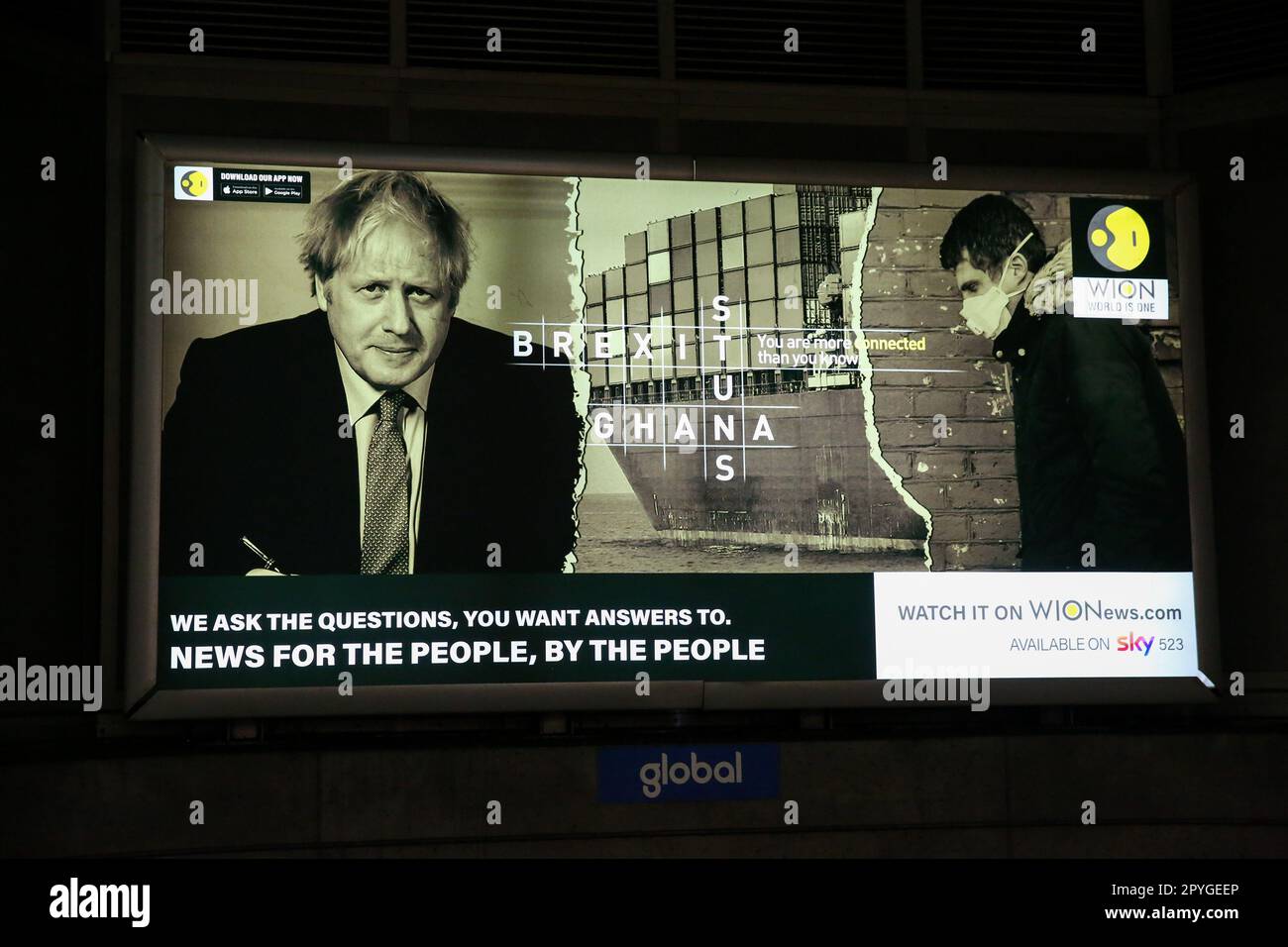 Former Prime Minister Boris Johnson appears on an advert displayed at a London underground station for WION news. WION is an Indian multinational English language news channel. Stock Photo