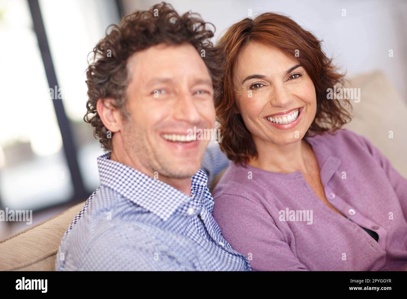 Im luck to be in love with my best friend. Portrait of a happy couple at home. Stock Photo