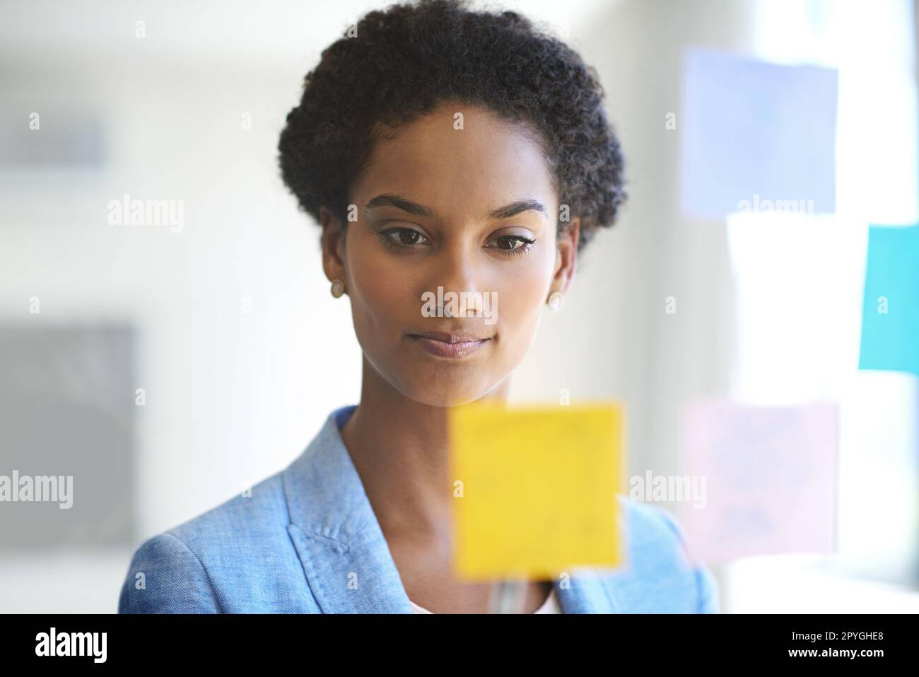 The idea room. a female designer working in a creative office Stock Photo Alamy
