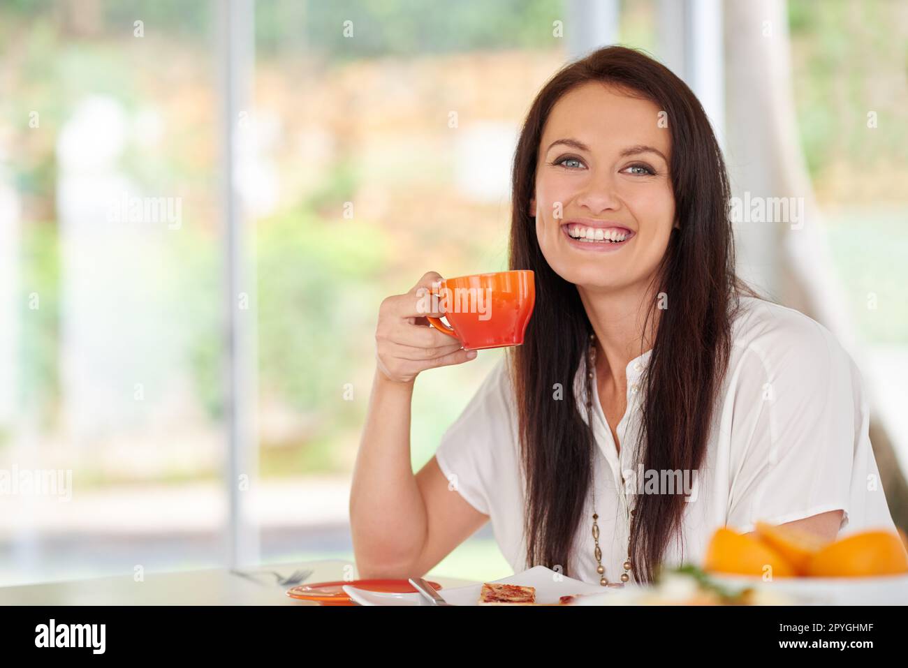 Morning Has Broken, Coffee Has Spoken. A Woman Sitting In A Kitchen 