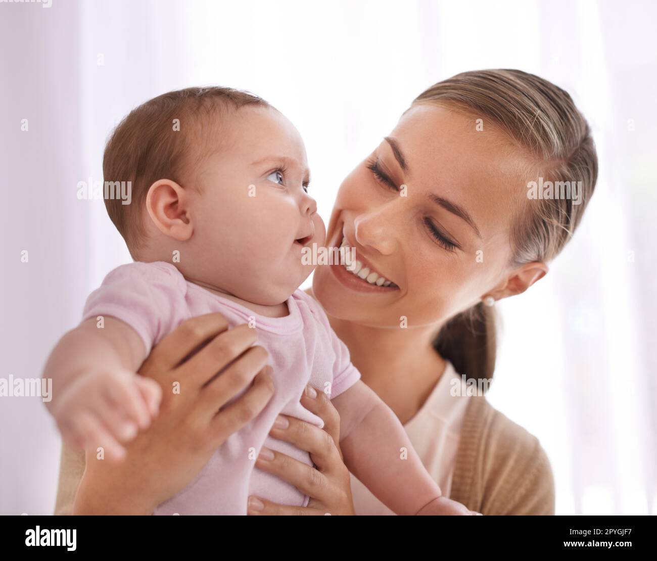 Shes my little angel. a young mother bonding with her baby girl. Stock Photo