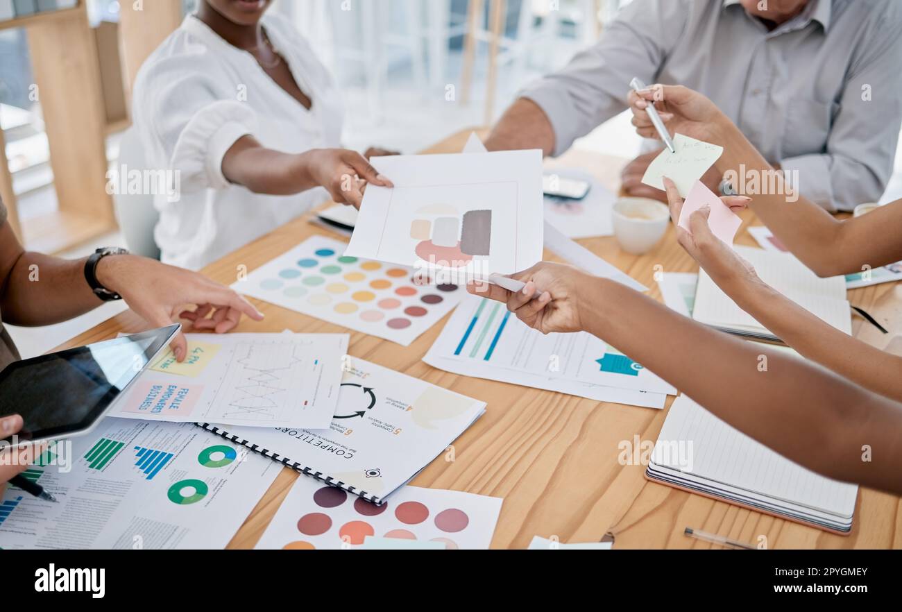 Business people hands and marketing documents in meeting in office Business people hands and marketing documents in meeting in office