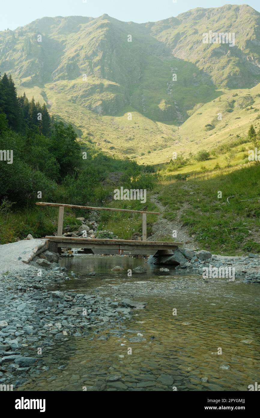Crystal clear blue water at the spring under the bridge Stock Photo - Alamy