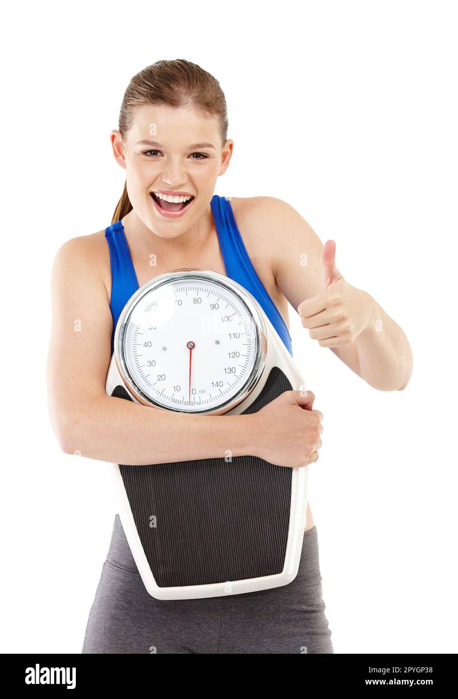 Happy with her weight. Portrait of a pretty teenage girl carrying a