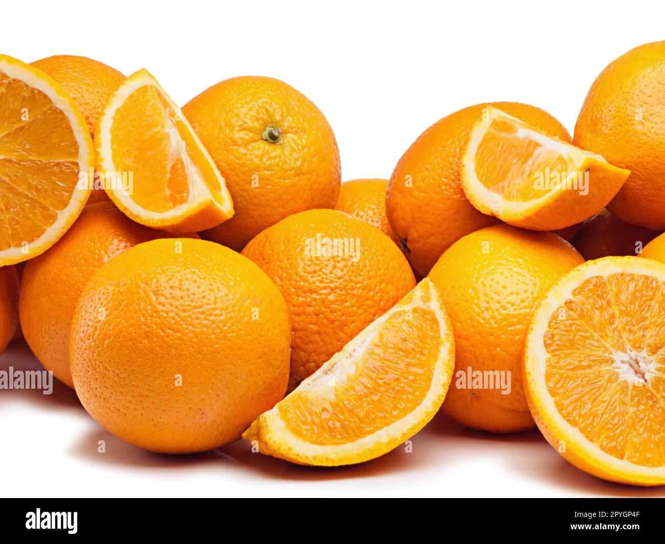 An abundance of citrus. Studio shot of a pile of oranges against a white background. Stock Photo