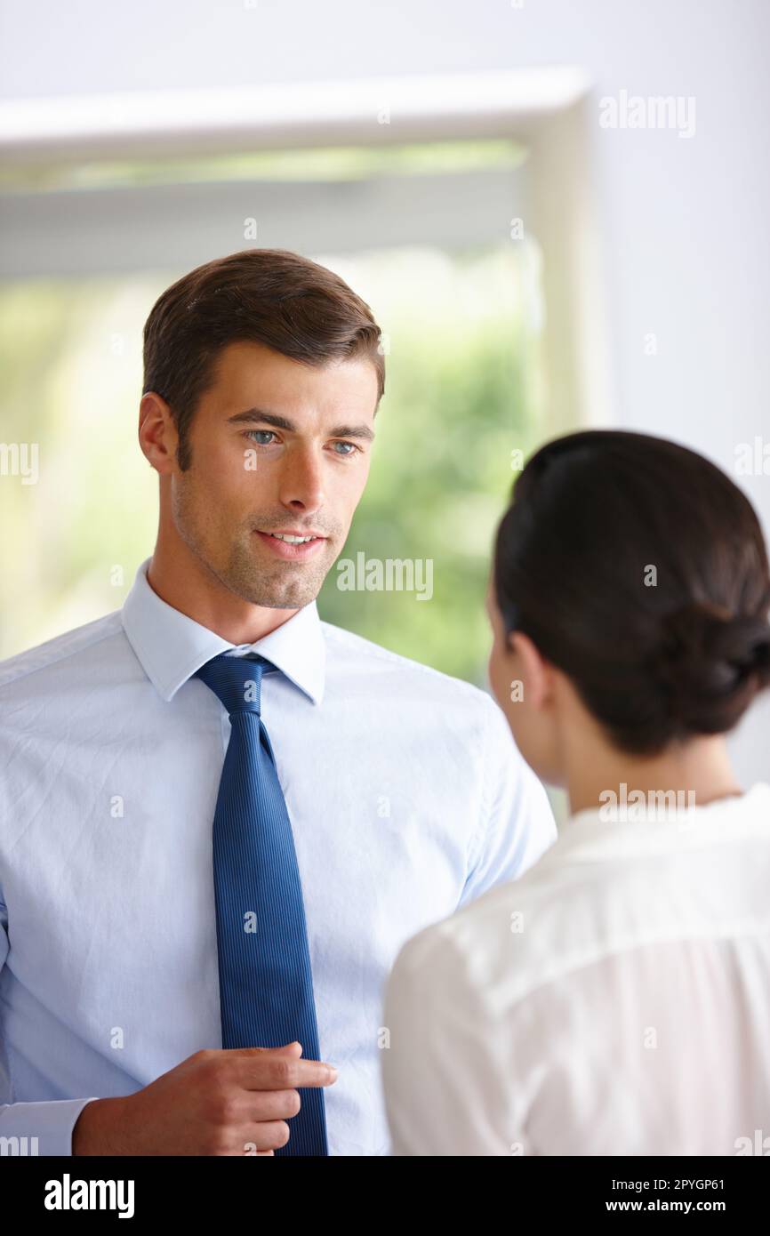 Gaining a new perspective. two business colleagues having a conversation. Stock Photo