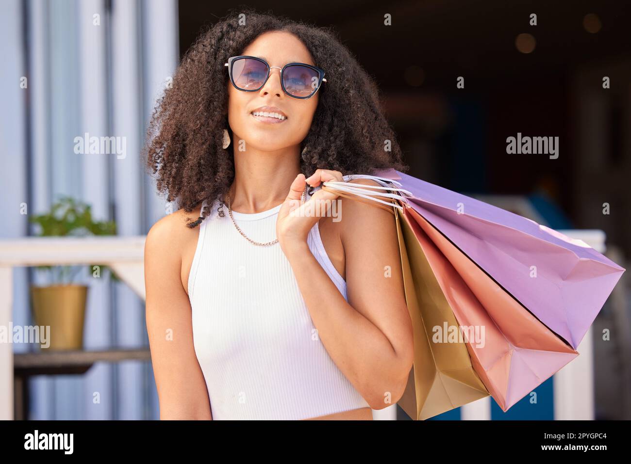 Shopping, city and happy friends or women walking together for retail  discount, sale and promotion with gen z lifestyle. Young diversity people  walk in urban street for fashion, wealth and clothes by
