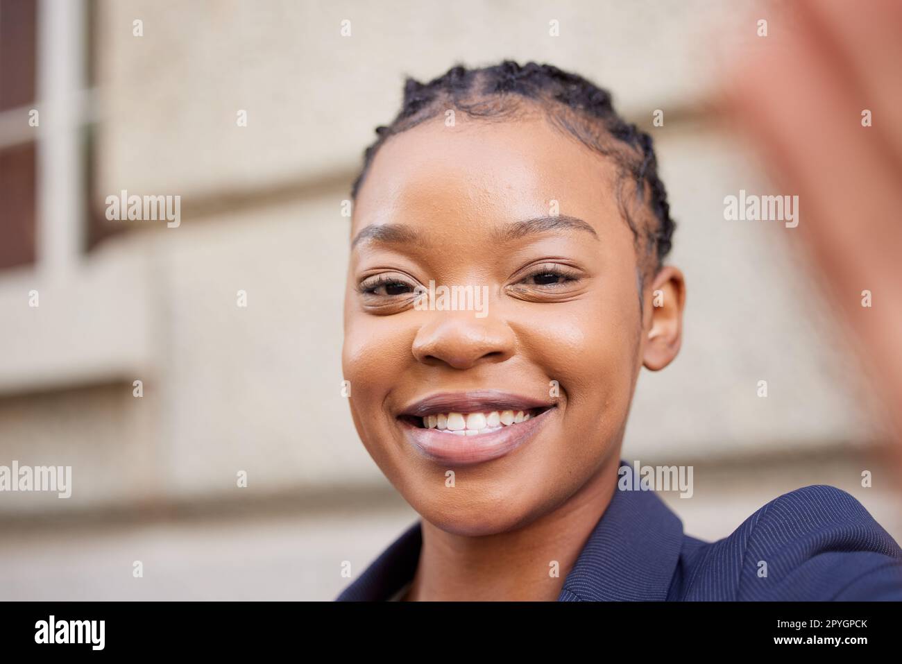 Black woman, business face and smile for a selfie while online for a social media update on leadership status or profile. Portrait of African entrepreneur outdoor happy about career choice and future Stock Photo