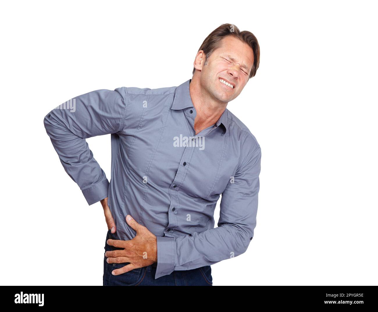 Pulled that muscle again. An isolated shot of a mid adult man holding