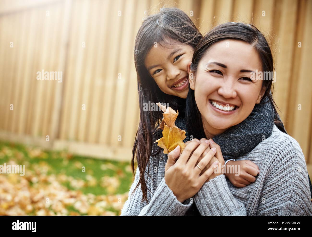 We do our autumn days outdoors. Portrait of an adorable little girl ...