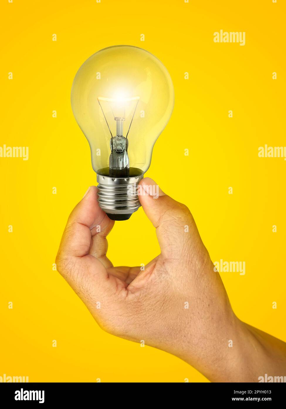 Concept creativity with Hand holding glowing light bulb  that sh Stock Photo