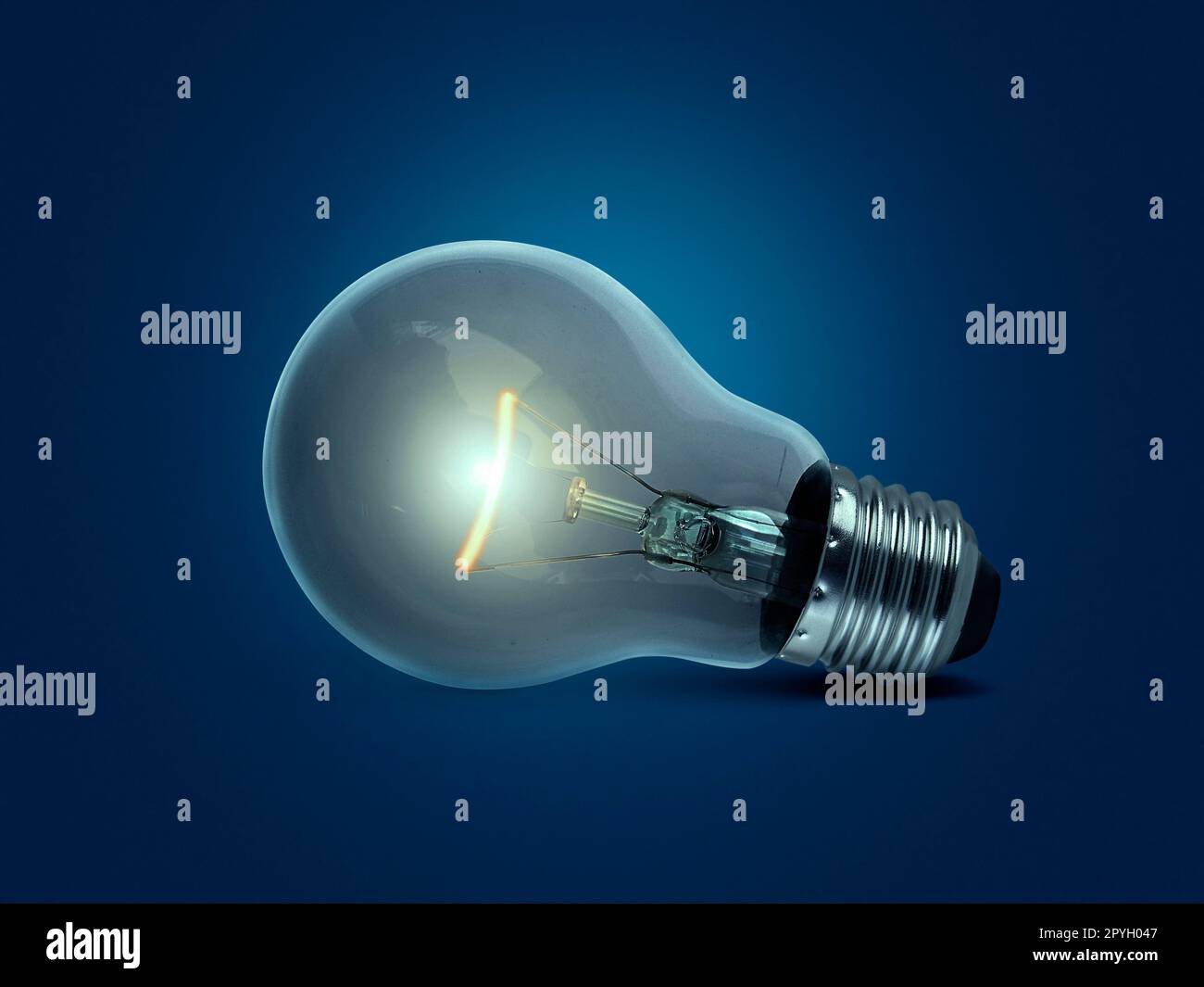 light bulb on blue background Stock Photo