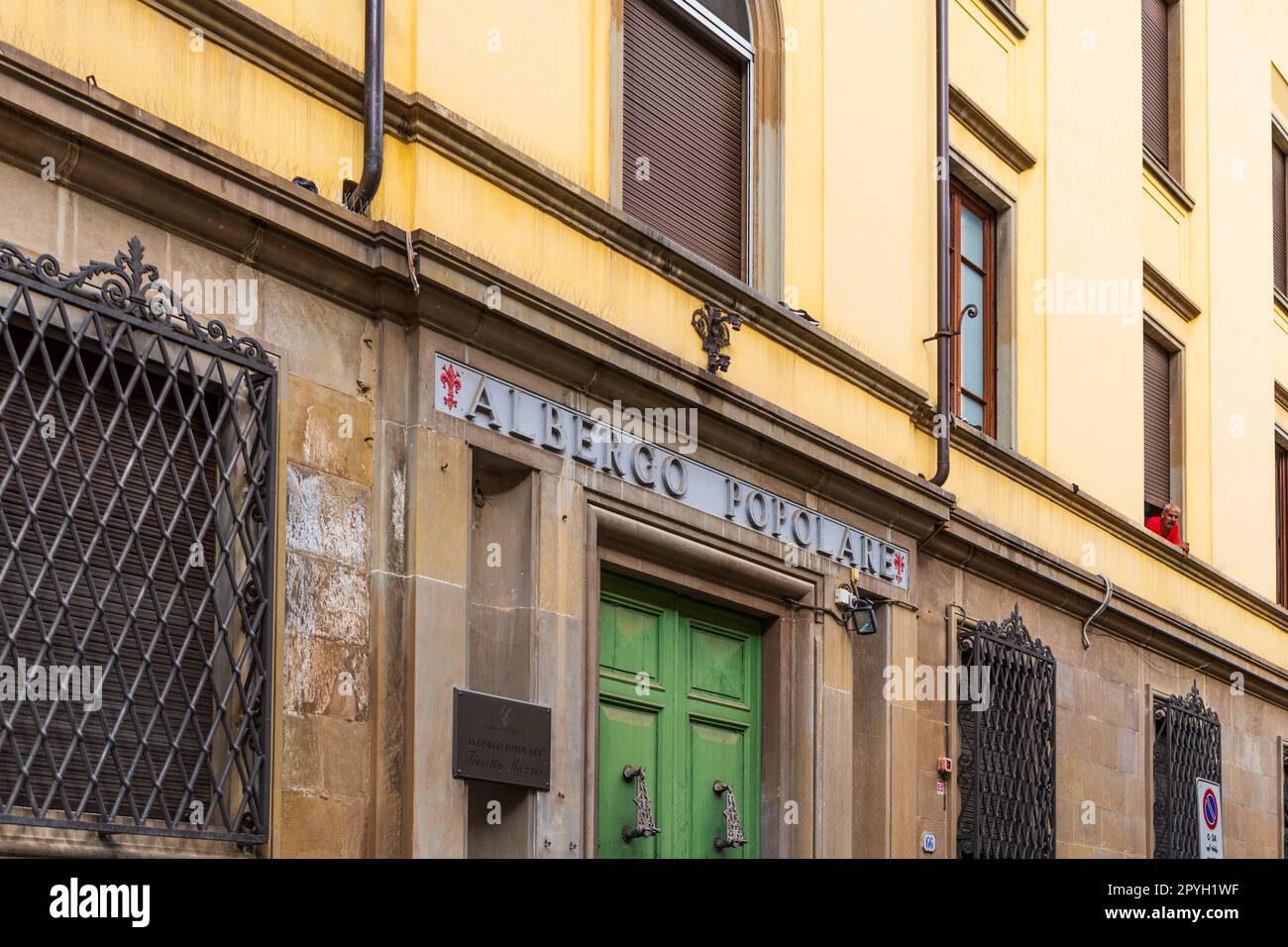 Albergo Popolare is a Florentine institution that shelters marginalized the homeless people, façade in via della Chiesa, Florence, Tuscany, Italy Stock Photo