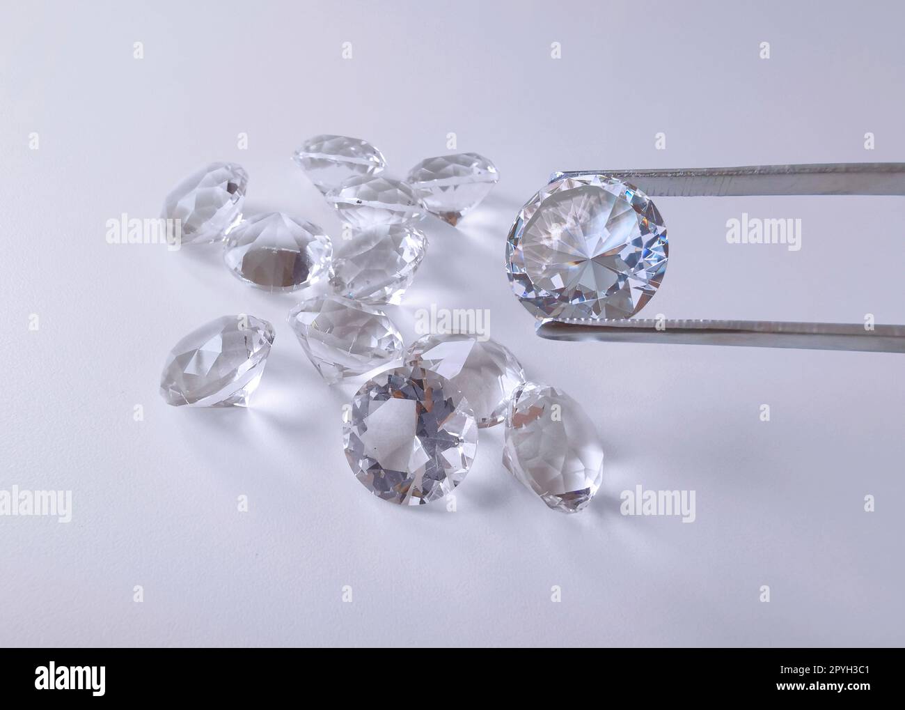 Brilliant cut diamond held hi-res stock photography and images - Alamy