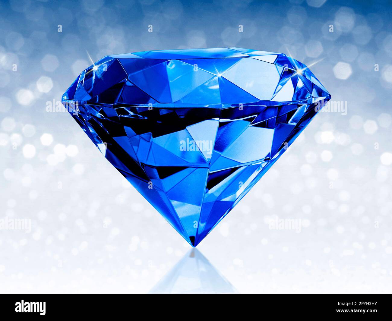 Dazzling diamond blue on blue shining bokeh background. concept for chossing best diamond gem design Stock Photo