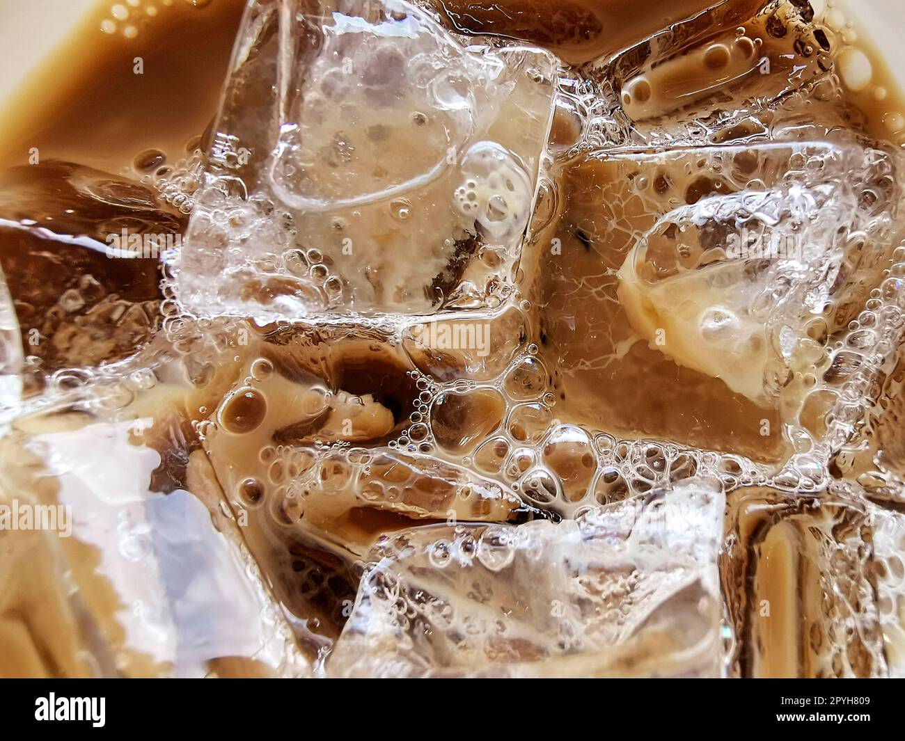 Ice cube tray with frozen coffee on grey table, closeup. Space for text  Stock Photo - Alamy