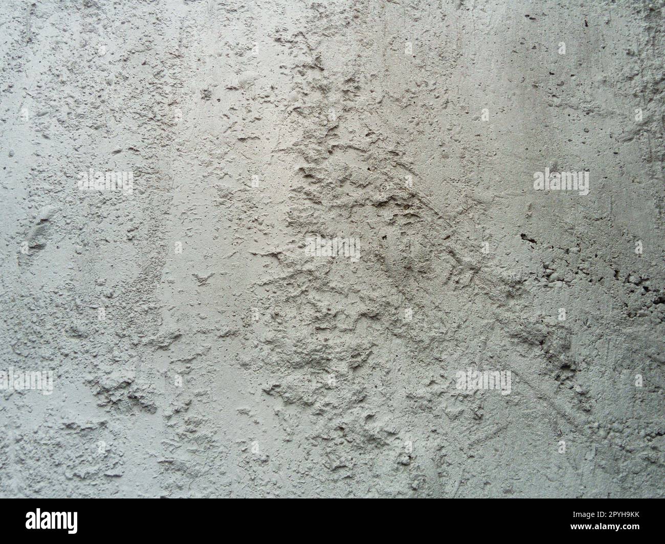 cement board background and texture. Unevenly set cement. Rough gray