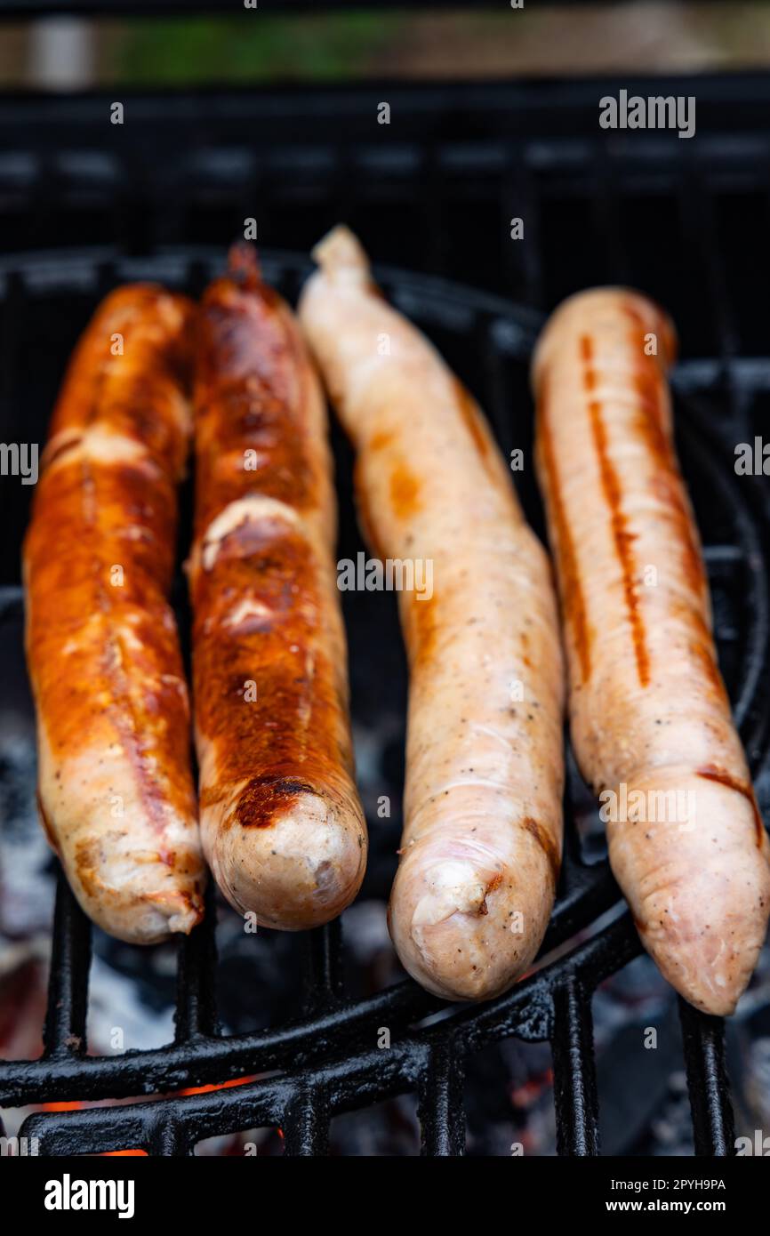 thuringian sausages on a charcoal grill Stock Photo