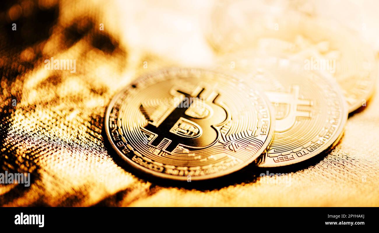 Closeup of golden bitcoin BTC cryptocurrency over black and gold  background. Virtual money and blockchain concept Stock Photo - Alamy